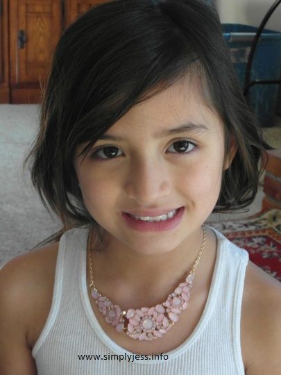 My little K looks very pretty in her new necklace
